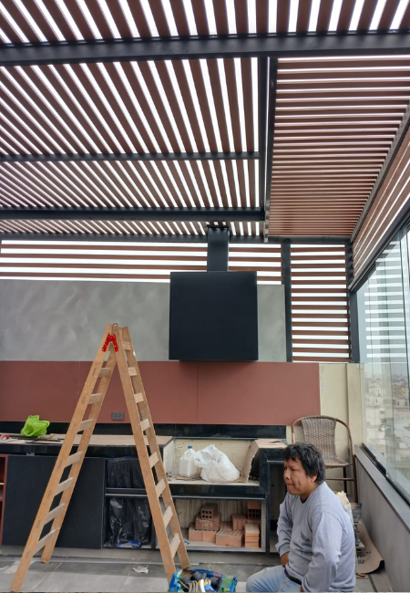 Instalacion de campana negra para parrilla 